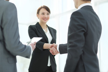 Negotiating business,Image business woman handshake