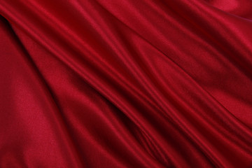 Fototapeta na wymiar Smooth elegant red silk or satin luxury cloth texture as abstract background. Luxurious background design