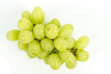 Fresh grapes on a white background