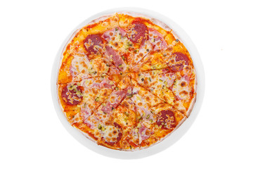 Pizza whole round, cut into pieces, on a white isolated background. Fast food in a pizzeria, a floury cheese product. View from above