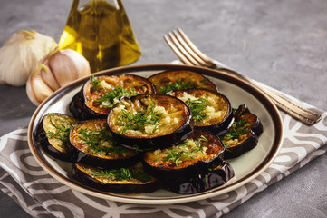 Fried eggplants with garlic and dill. 