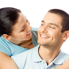 Happy smiling young couple, on white