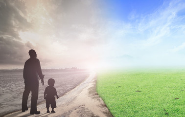 World environment day concept: Father and child standing between climate worsened with good...