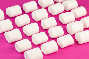 Fluffy Sweet Marshmallow on Pink Background. Food with Sugar Concept. In a circle