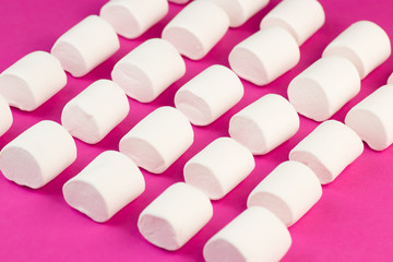 Fluffy Sweet Marshmallow on Pink Background. Food with Sugar Concept. In a circle