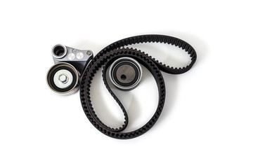 Kit of timing belt with rollers on a white background isolated. Auto Parts. Spare parts.