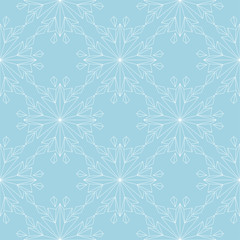 White floral seamless design on blue background