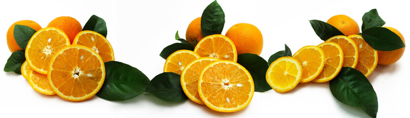 Oranges with green leaves isolated on white background.