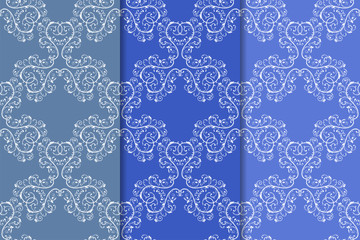 Set of floral ornaments. Vertical blue seamless patterns