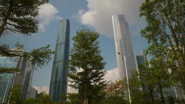 sunny day guangzhou city downtown megatalls park slow motion panorama 4k china
