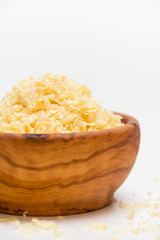 SOAP in a bowl of wood flakes. This SOAP is handmade.