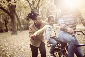 African American family in park.