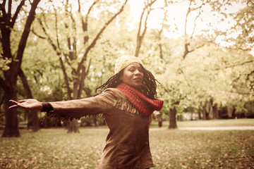 African American woman on meadow.