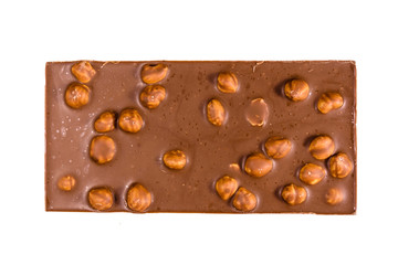 Dark chocolate with hazelnuts isolated on a white background