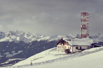 mountain chalet house with weather antenna