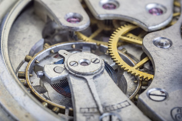 Macro shot of clockwork gears inside the old watch