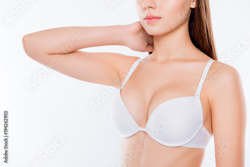 Cropped Close Up Photo Of Beautiful Woman S Breast Clothed In White