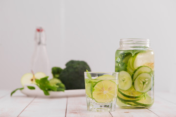 Detox water with vegetables and fruits. Diet healthy eating and weight loss.