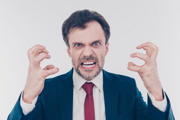 You are fired! Close up portrait of aggressive terrifying  frightening demonstrating teeth gesturing with hands boss wearing red tie dark blue jacket isolated on gray background