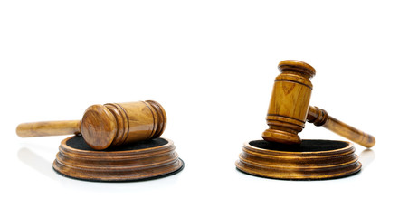 wooden gavel closeup on a white background