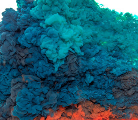 Abstract paint background multi color ink splash in the water isolated on white background