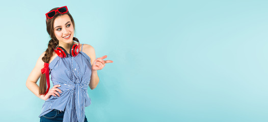 Young sexy woman with headphones