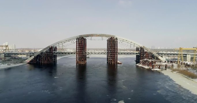 Rusty unfinished bridge in Kiev, Ukraine. Combined car and subway bridge under construction.