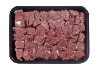 Supermarket plastic tray with veal isolated on white background. Top view