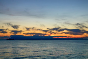 Fototapeta na wymiar Beautiful natural sunset over sea