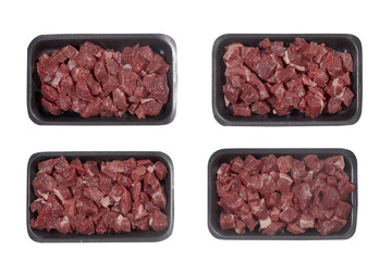 Supermarket plastic tray with veal isolated on white background. Top view