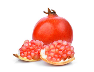whole and seed pomegranate fruit isolated on white background