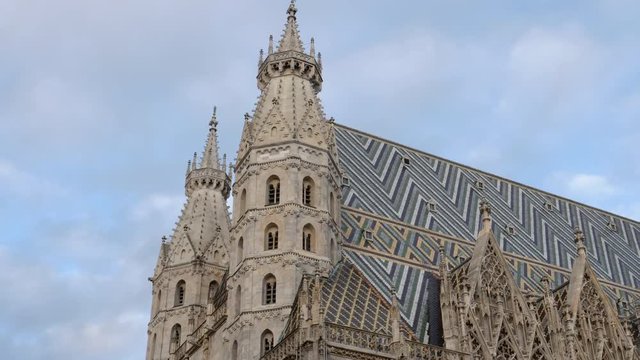 a tilt down shot of the exterior front of st stephen's cathedral in vienna, austria