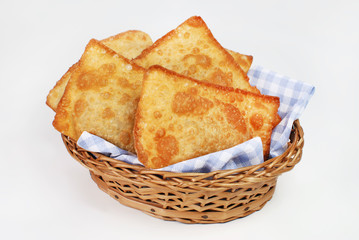 Brazilian typical pastry called pastel in white background  - obrazy, fototapety, plakaty
