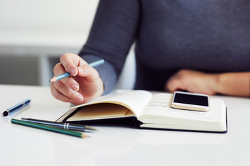Close up of woman sketching graphic sketch in office