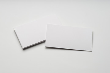 Mockup of business cards fan stack at white background.