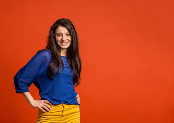 Portrait of a young beautiful woman in studio.