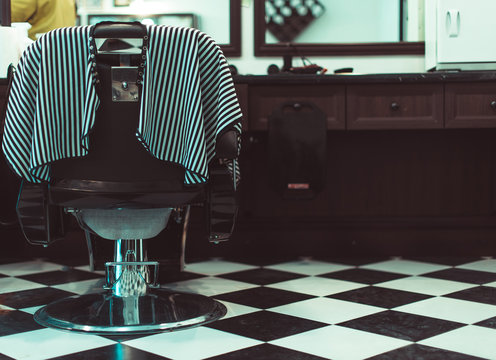 The Barber chair. Over the working day in barbershop.