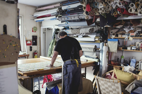 Man working in textile workshop