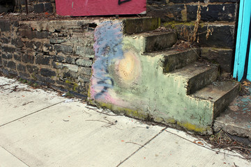 Abandoned brick building with peeling paint 