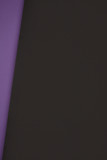 dark black and violet geometric background from colored paper