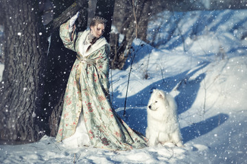 Fairy girl with a white dog