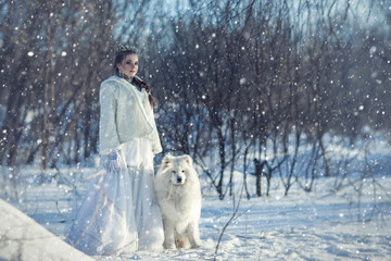Fairy girl with a white dog