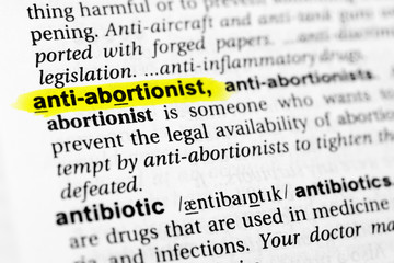 Highlighted English word "anti abortionist" and its definition in the dictionary