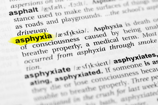 Highlighted English word "asphyxia" and its definition in the dictionary