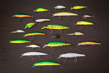 Artificial lure. Wobblers on wooden background