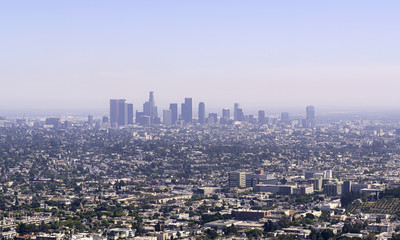 Skyline of downtown Los Angeles in a sunny summer day with clear blue sky. Business and financial...