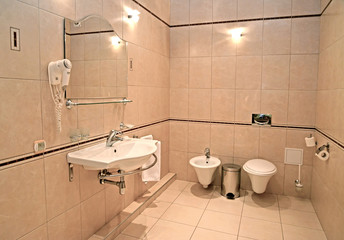 Bathroom in beige tones. Interior