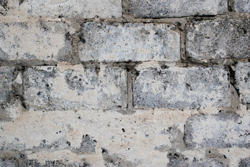 Gray concrete blocks of old construction