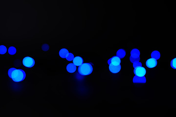 abstract dark blue bokeh background or texture