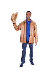 Handsome man standing in brown leather jacket